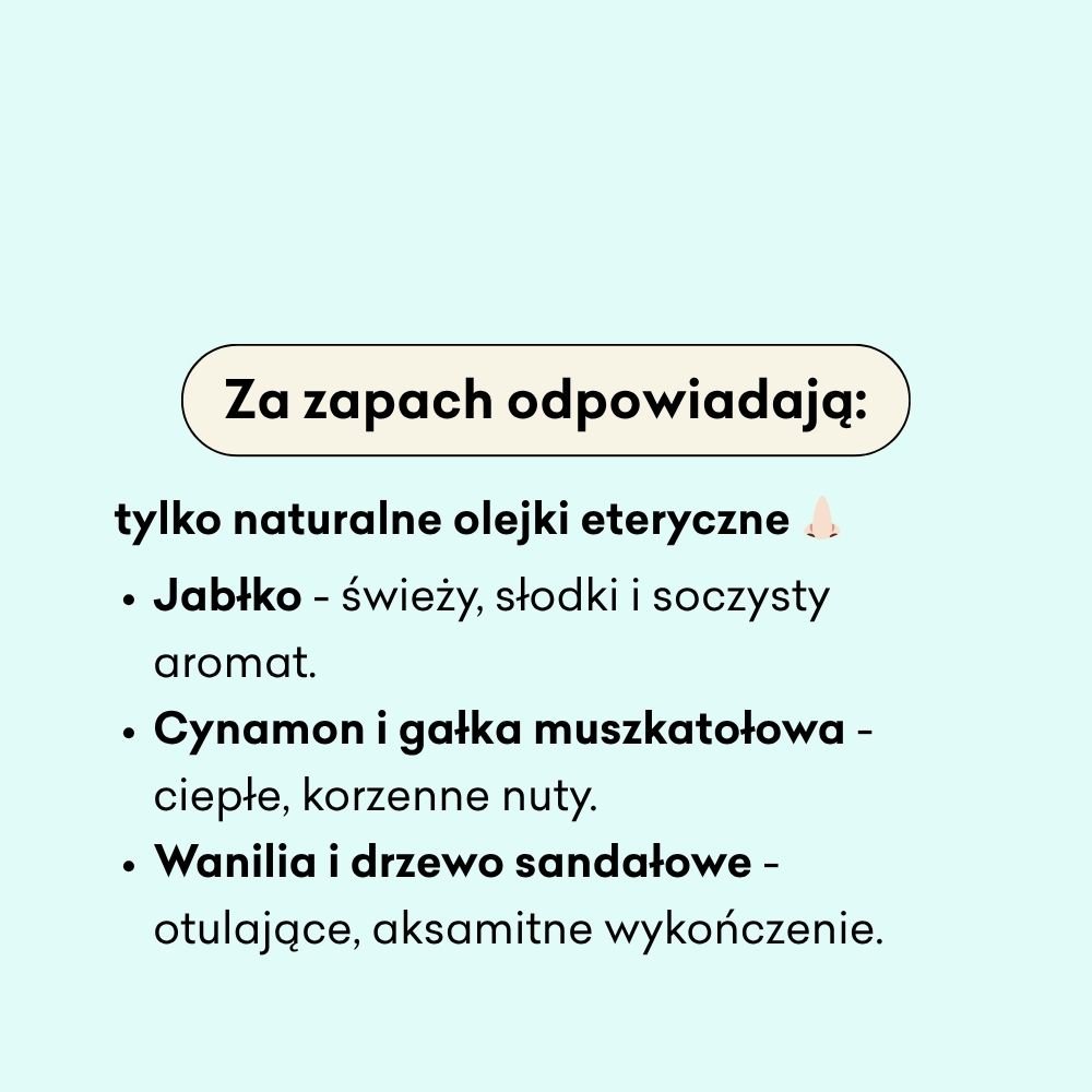 Tekst w języku polskim na jasnym tle wymieniający naturalne olejki eteryczne odpowiedzialne za zapach: jabłko, cynamon i gałka muszkatołowa, wanilia i drzewo sandałowe, z krótkimi opisami każdego aromatu.